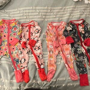 Lot of 4 baby girls Little Sleepies size 0-3 months